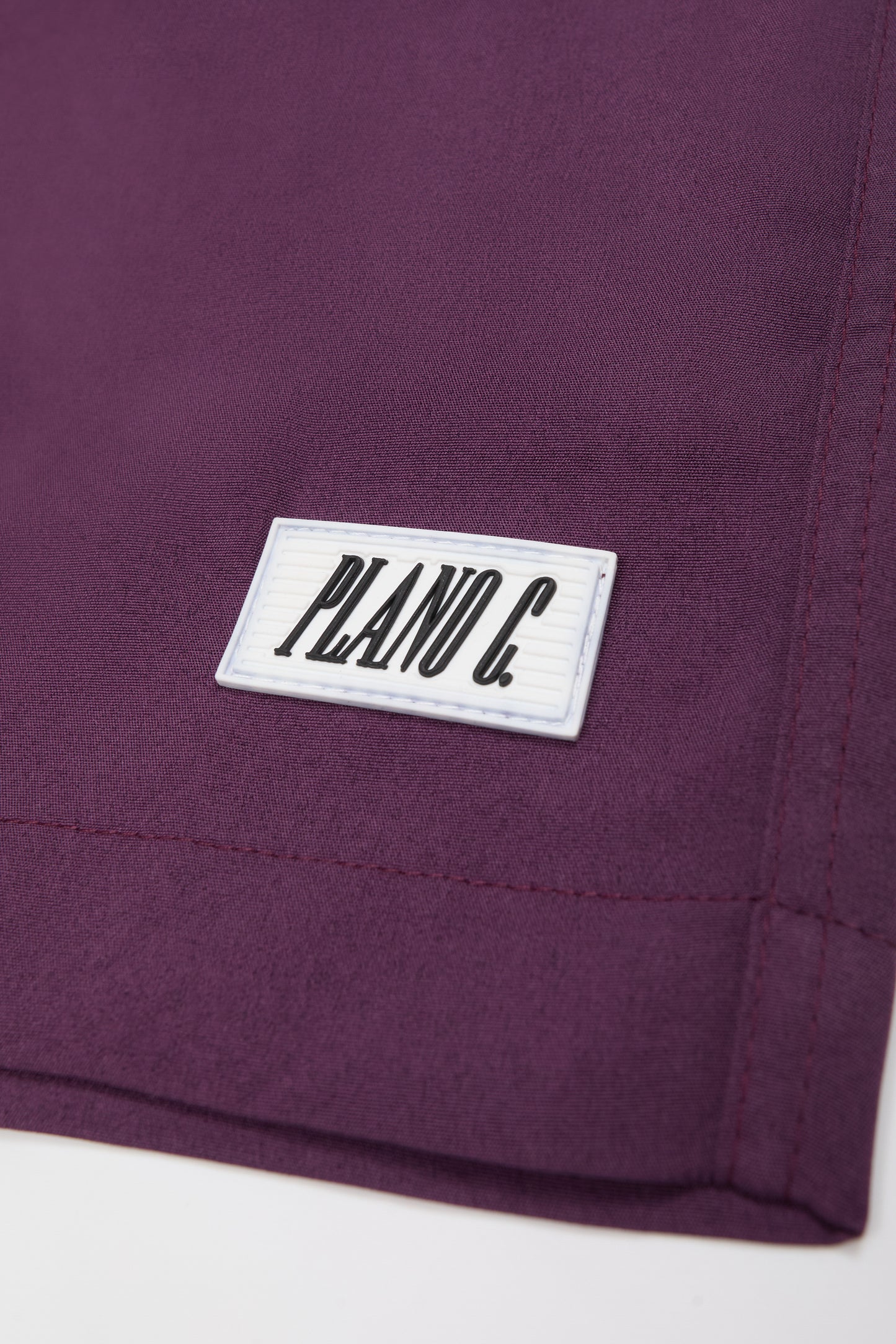 SHORTS LOGO ROXO PRUNE