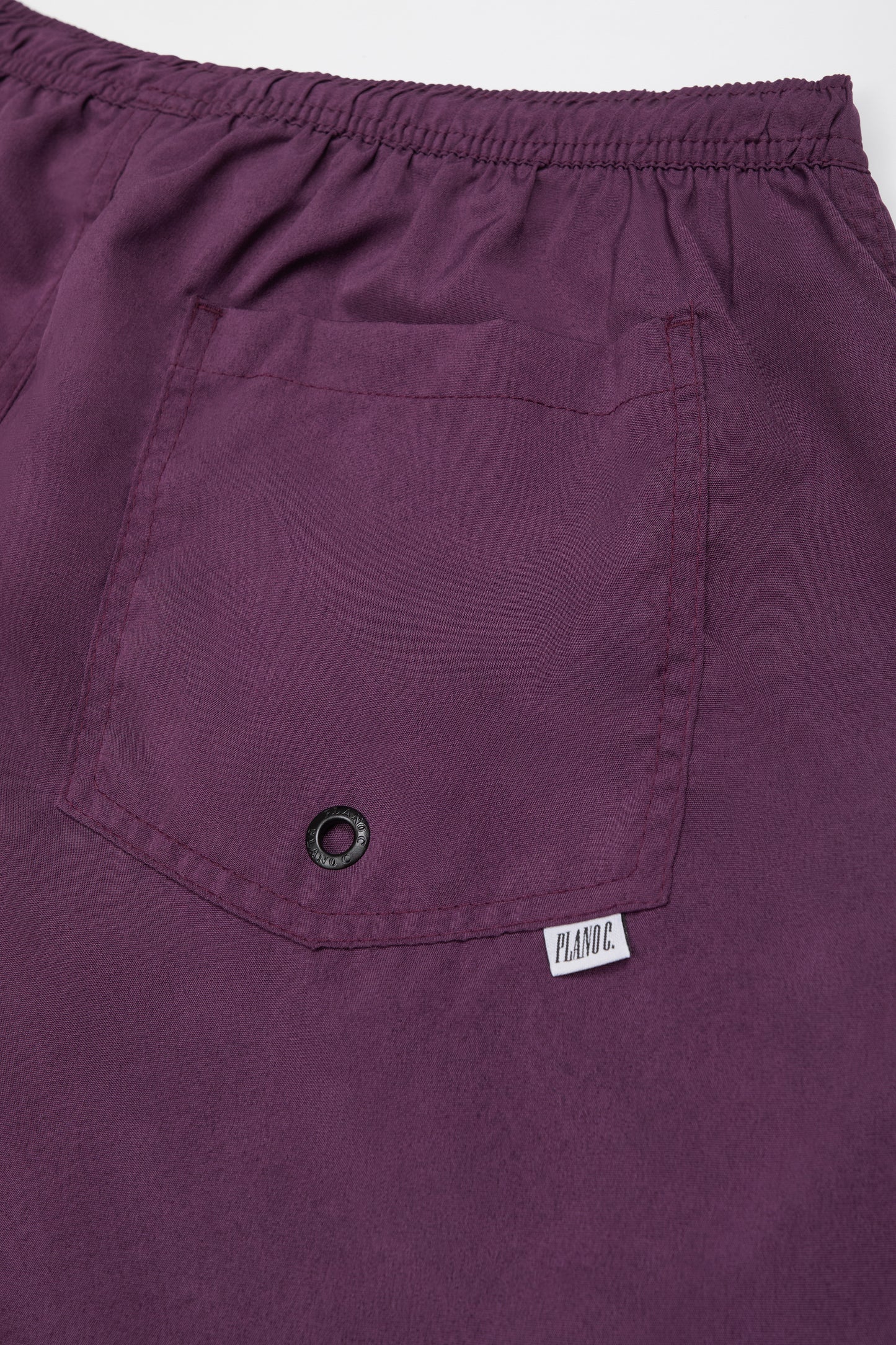 SHORTS LOGO ROXO PRUNE